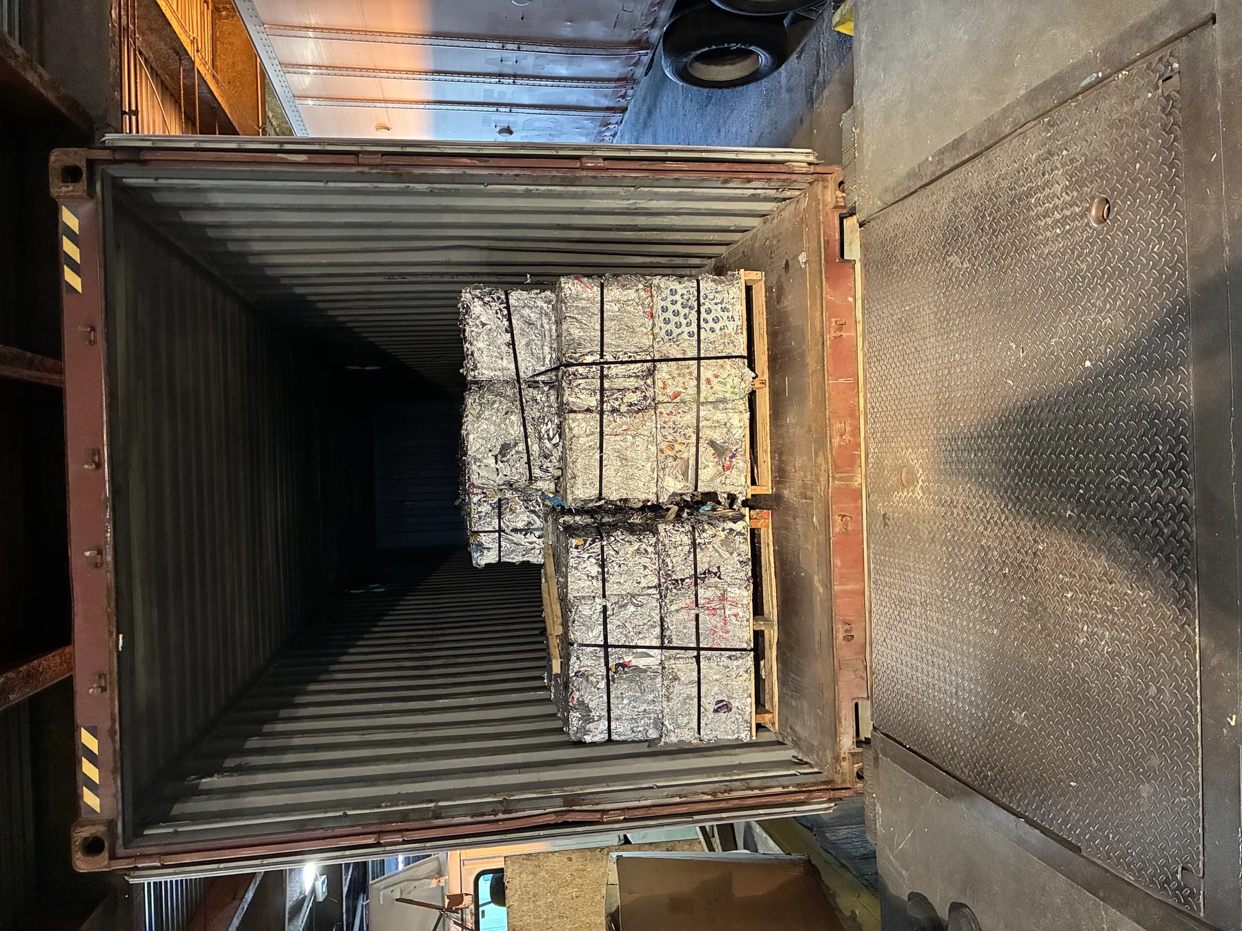 Aluminum foil bales loaded into a Continental Exports container